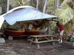 Click to enlarge canoes in boat shed